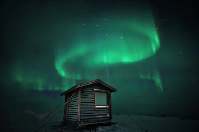 Aurora borealis in the night sky above Finland