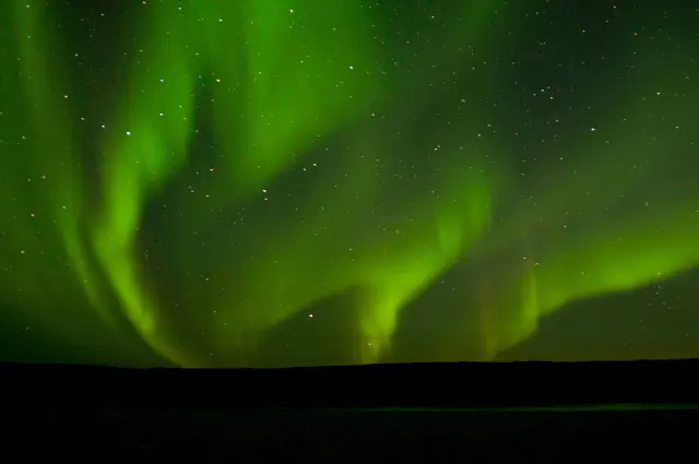 Aurora borealis in the night sky above Scotland