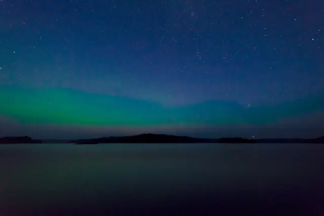Aurora borealis in the night sky above Canada