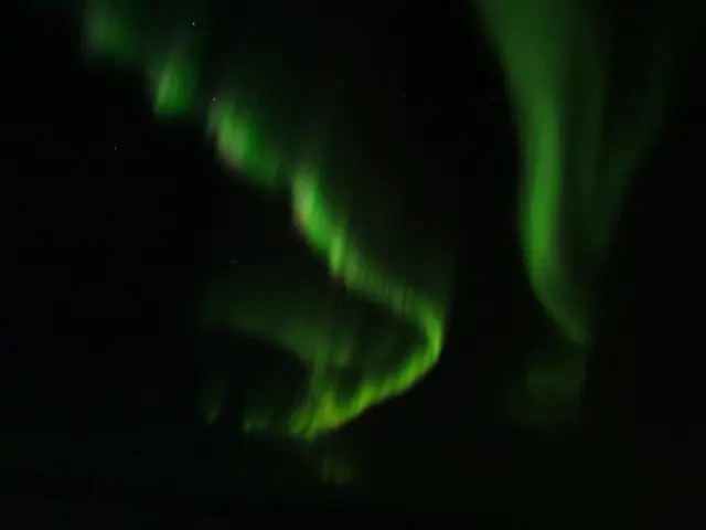 Aurora borealis in the night sky above Finland