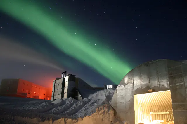 Aurora borealis in the night sky above Alaska